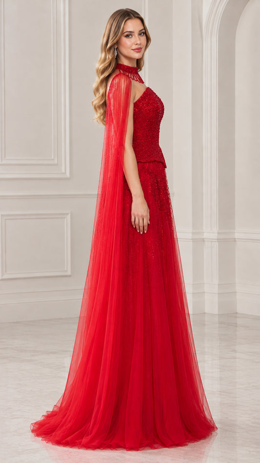 Side profile view of red formal cape gown showing sweeping tulle length