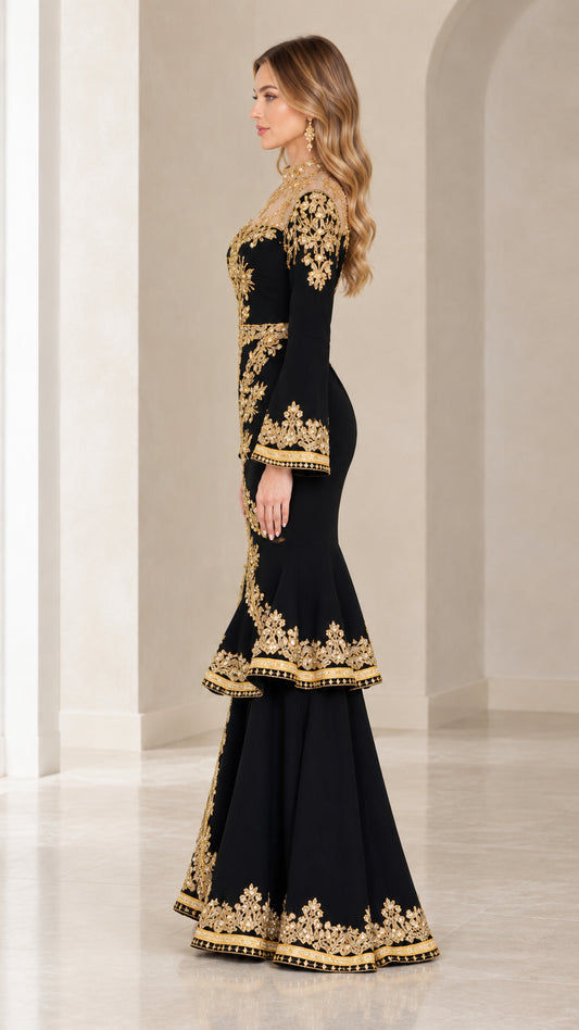 Side profile of elegant black long-sleeve formal dress with gold embellishments