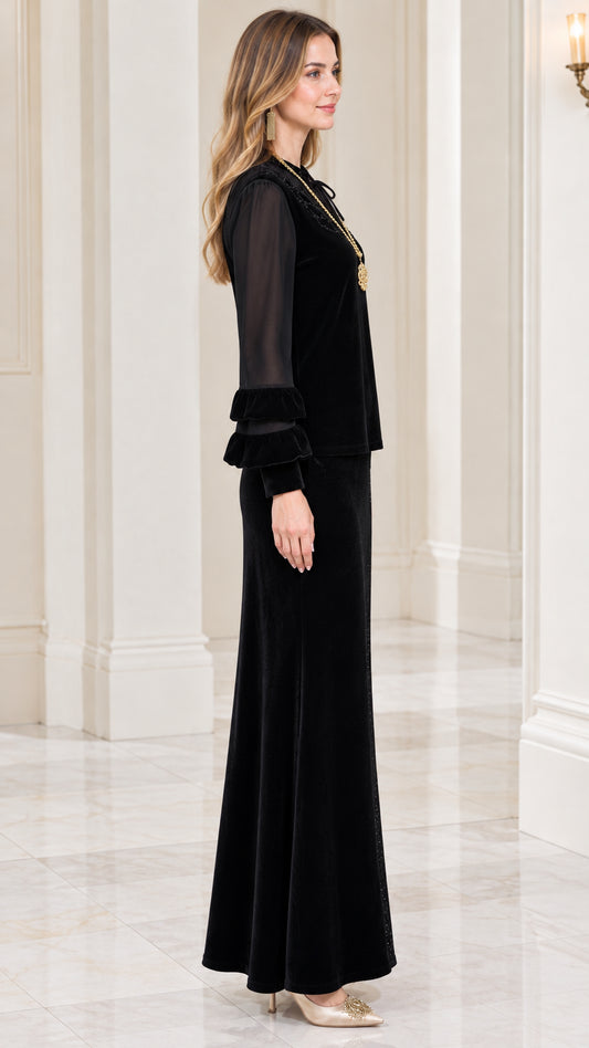 Side profile view of black velvet two-piece formal skirt set