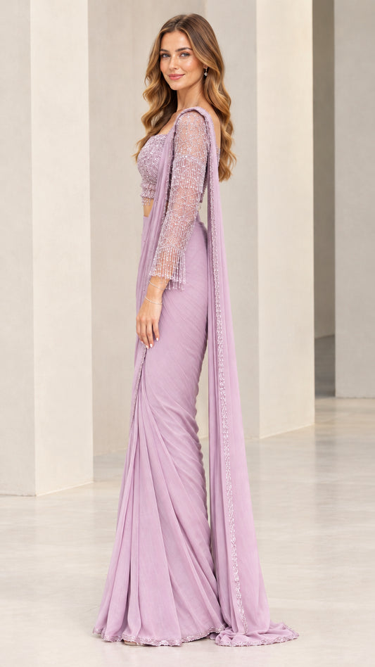 Side profile of model wearing a lavender ready-to-wear saree with shoulder drape