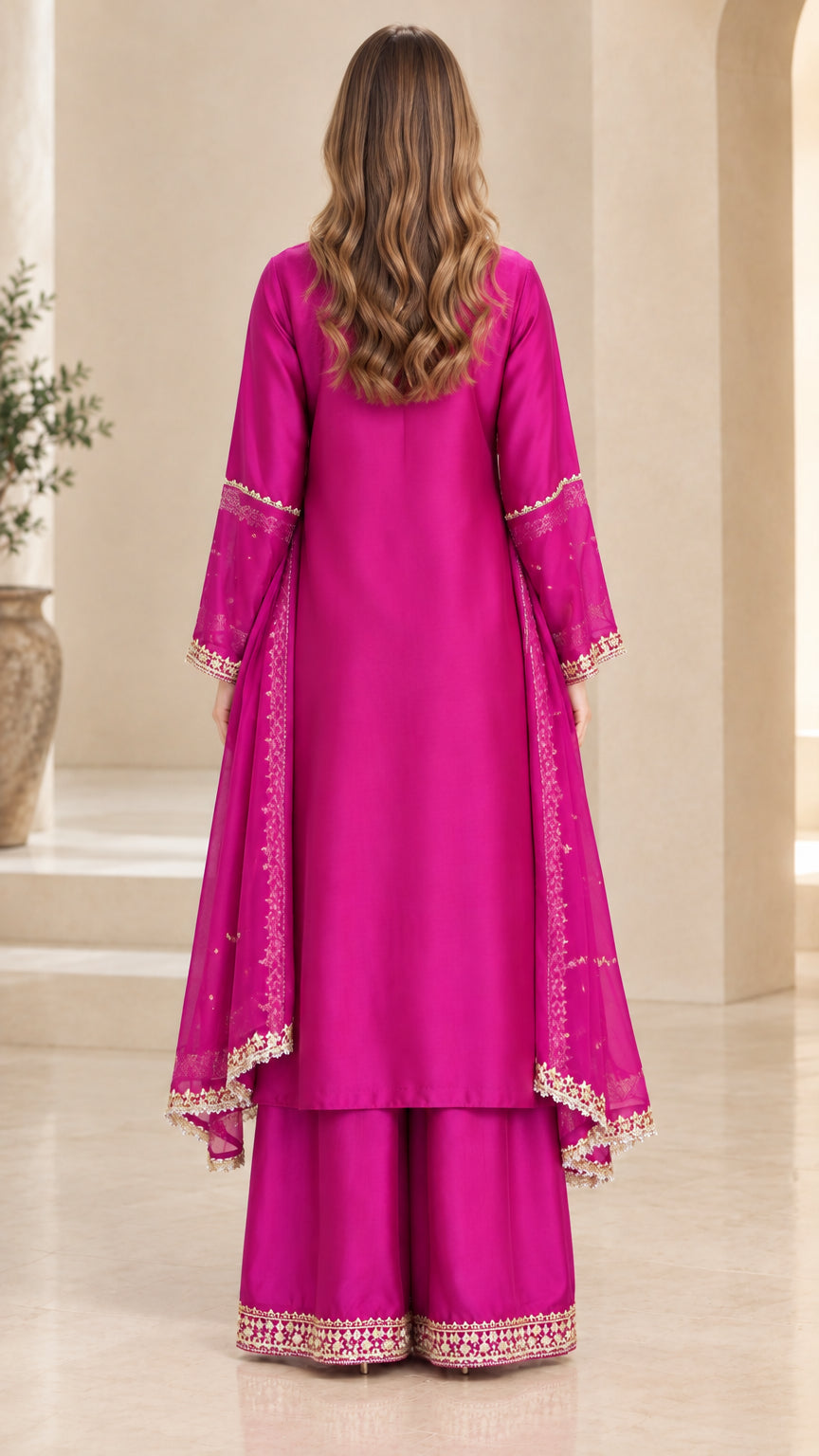 Back view of magenta embroidered kurta suit set showing dupatta drape