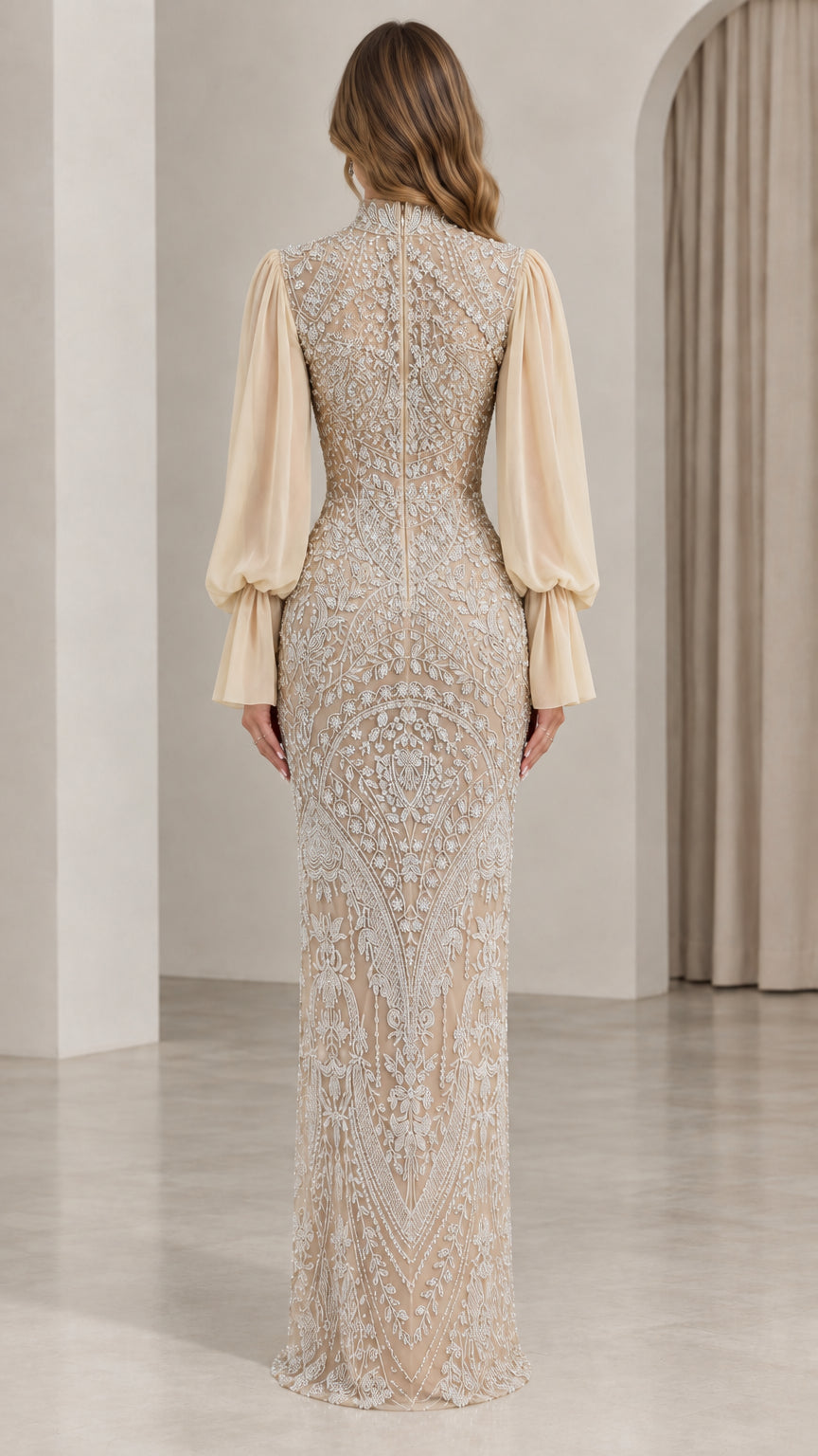 Back view of model wearing high-neck champagne beaded formal gown