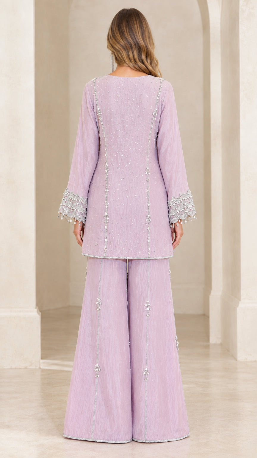 Back view of women's lilac long sleeve tunic and wide leg pants set