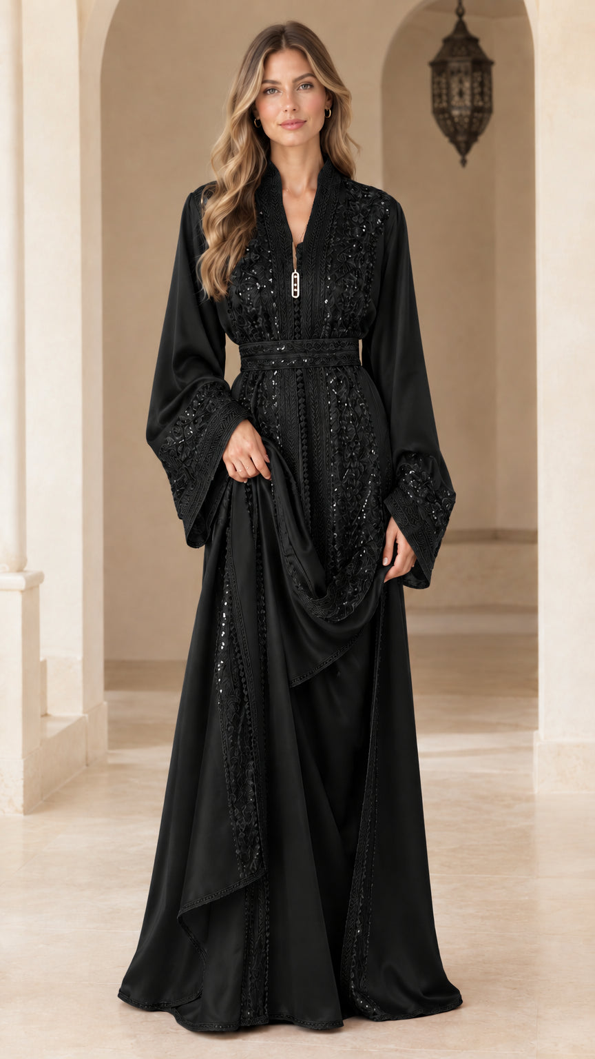 Model wearing black embroidered sequin belted kaftan maxi dress