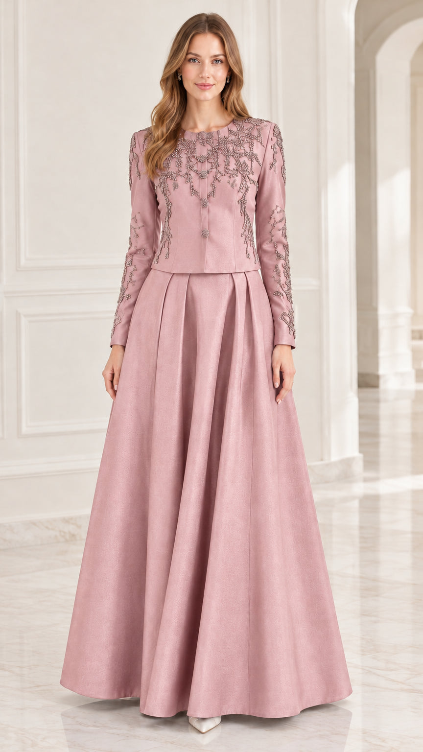 Dusty rose pink long-sleeve beaded evening gown with pleated skirt on model