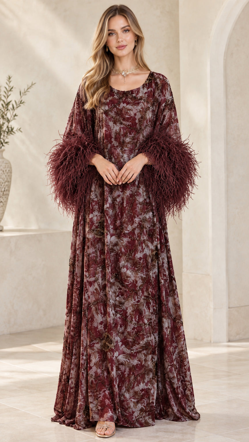 Model wearing burgundy wine printed kaftan dress with deep red feather cuffs
