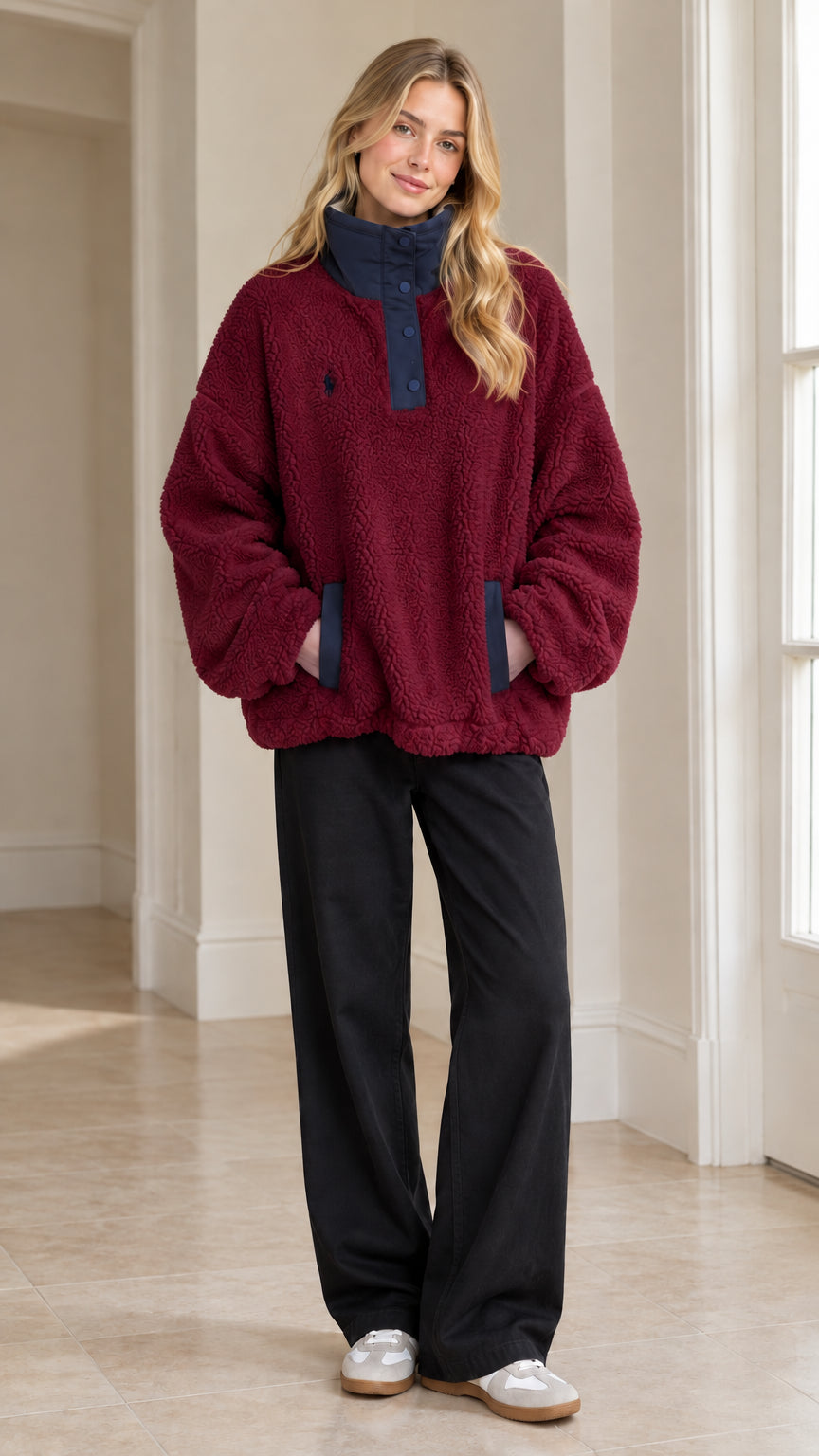 Full-length view of woman wearing Burgundy sherpa fleece snap-neck pullover