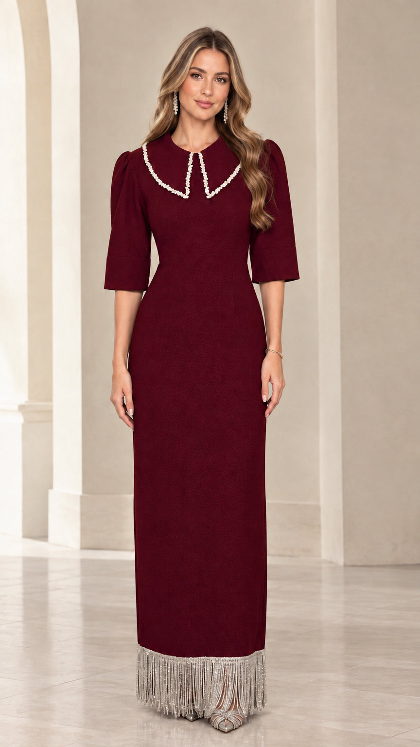 Front view of burgundy wine red pearl collar formal dress with tassel hem