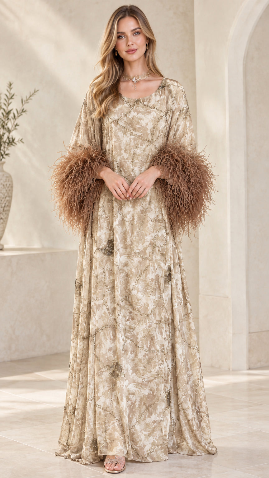 Model wearing champagne beige printed kaftan dress with warm brown feather cuffs