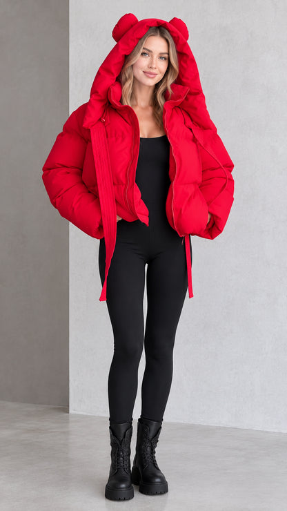 Full front view of model wearing red cropped puffer jacket with bear ear hood