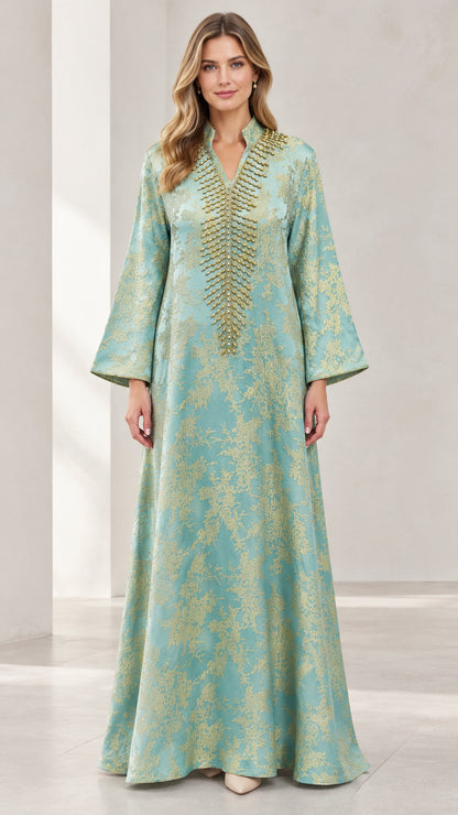 Front view of woman wearing Mint Green metallic jacquard beaded neckline kaftan maxi dress