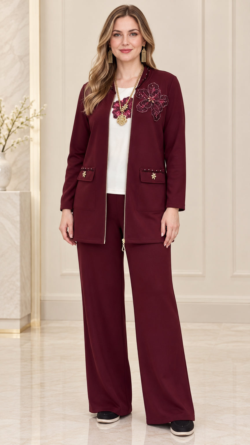 Full front view of women's burgundy two-piece floral embellished jacket and wide-leg pants set