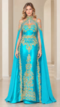 Turquoise formal evening gown with gold embroidery, beaded halter collar, and attached cape sleeves
