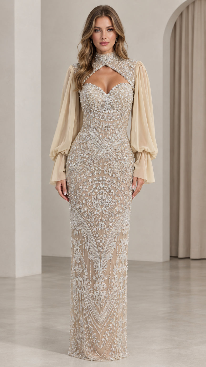 Front full-length view of model in champagne sequin beaded evening gown with balloon sleeves
