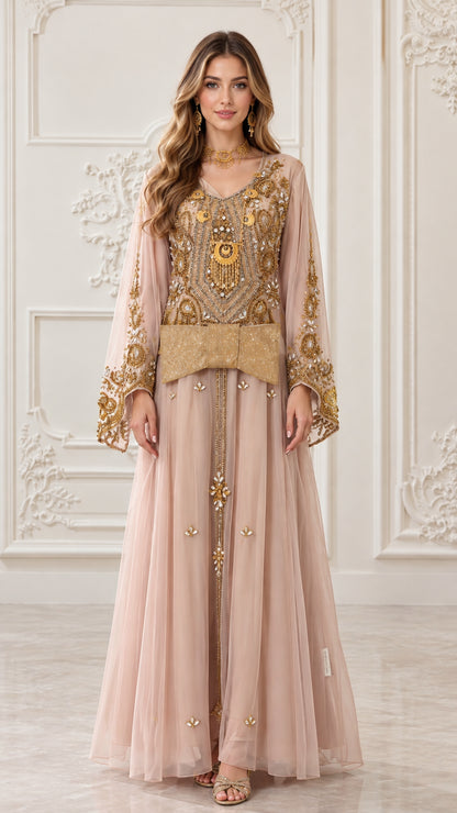 Front full-length view of blush pink embroidered gold beaded kaftan maxi dress