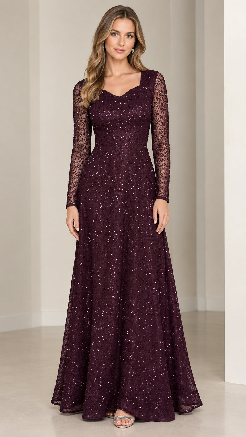 Front view of model wearing burgundy long sleeve sequin lace evening gown