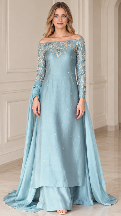 Full front view of dusty blue off-the-shoulder embroidered evening gown set with long sleeves and flowing drape