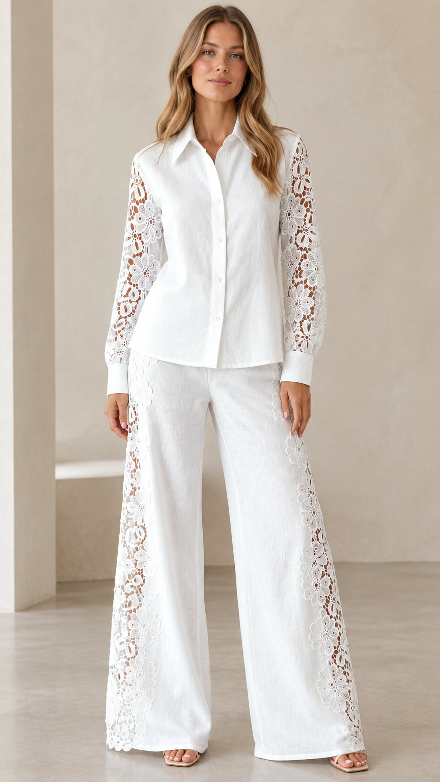 Front view of woman wearing white floral lace button-up shirt and wide-leg trousers two-piece set