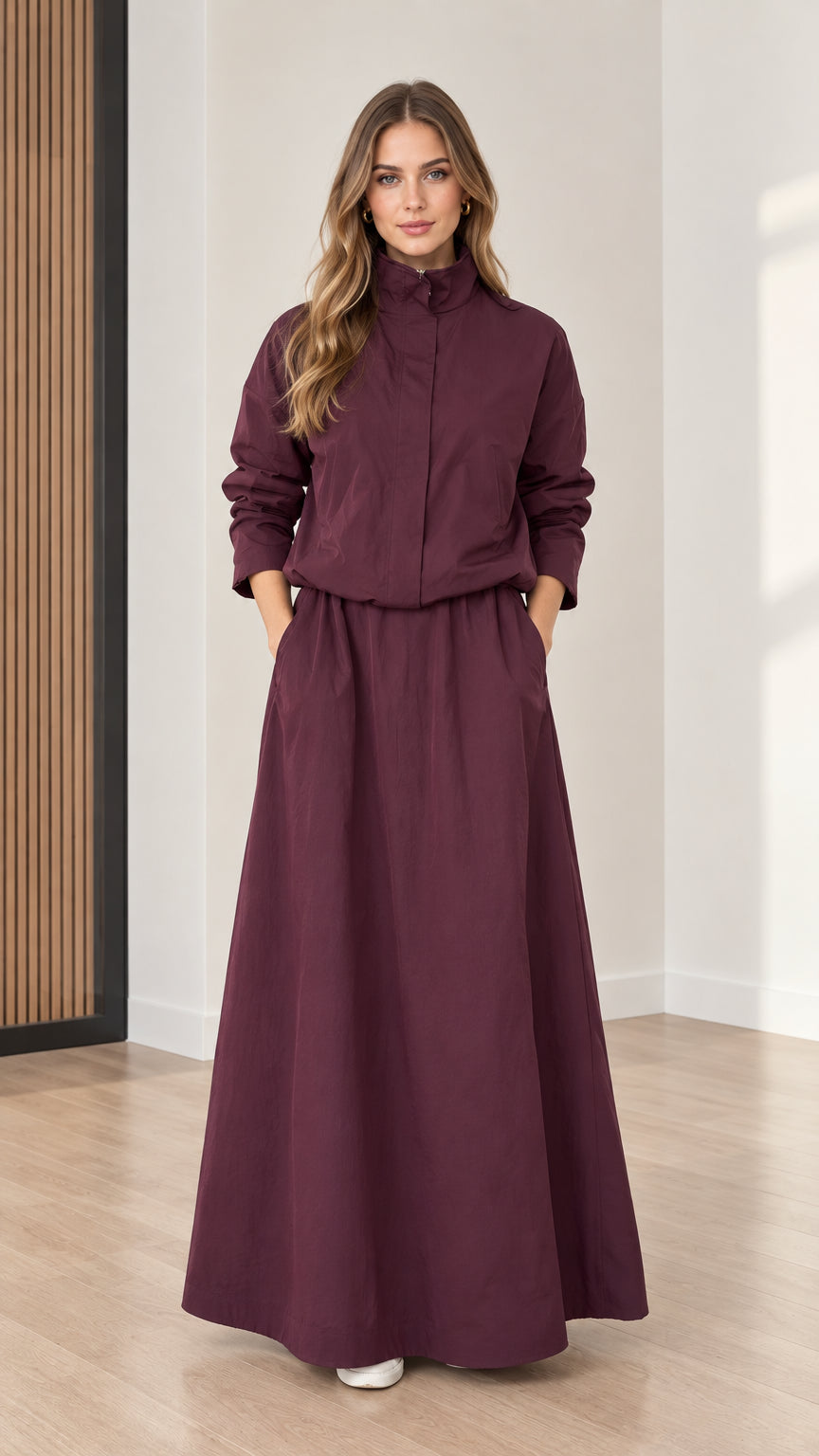 Front view of model wearing Burgundy stand collar long sleeve maxi dress