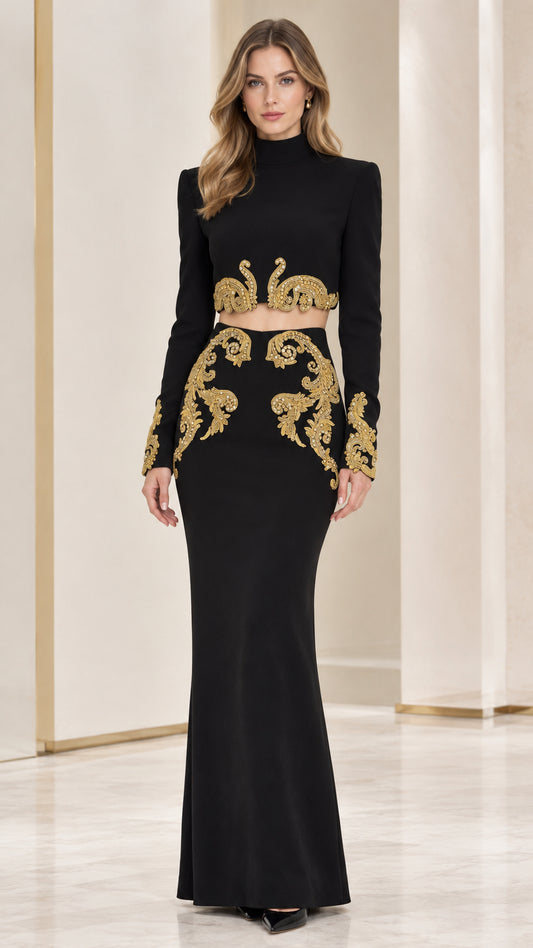 Front full-length view of woman wearing Black two-piece formal dress with gold embroidery