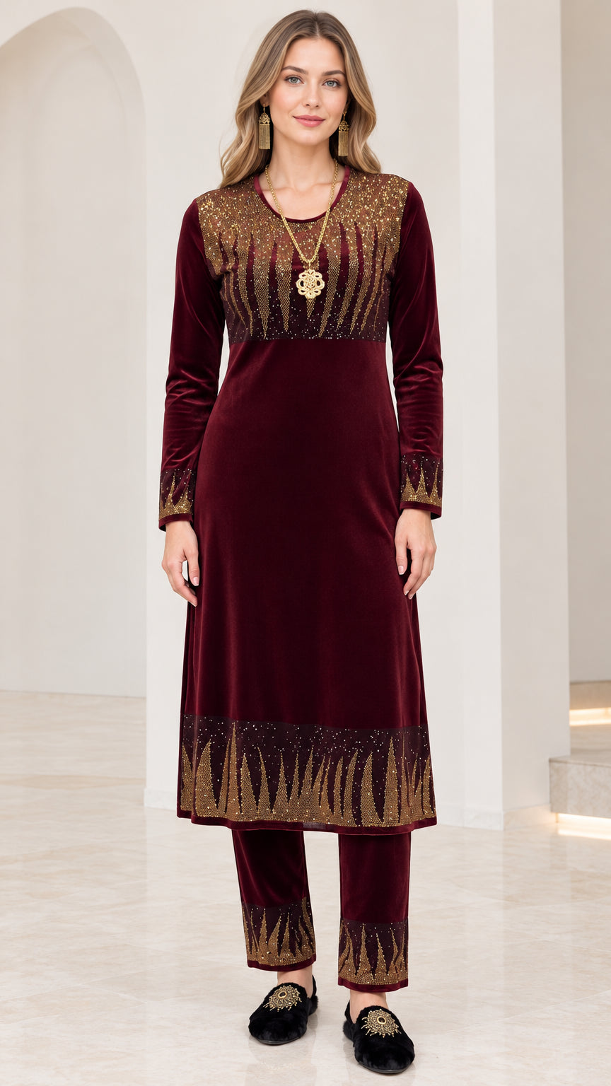 Full front view of women's burgundy velvet tunic and matching straight pants with gold embellishments