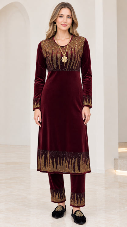 Full front view of women's burgundy velvet tunic and matching straight pants with gold embellishments