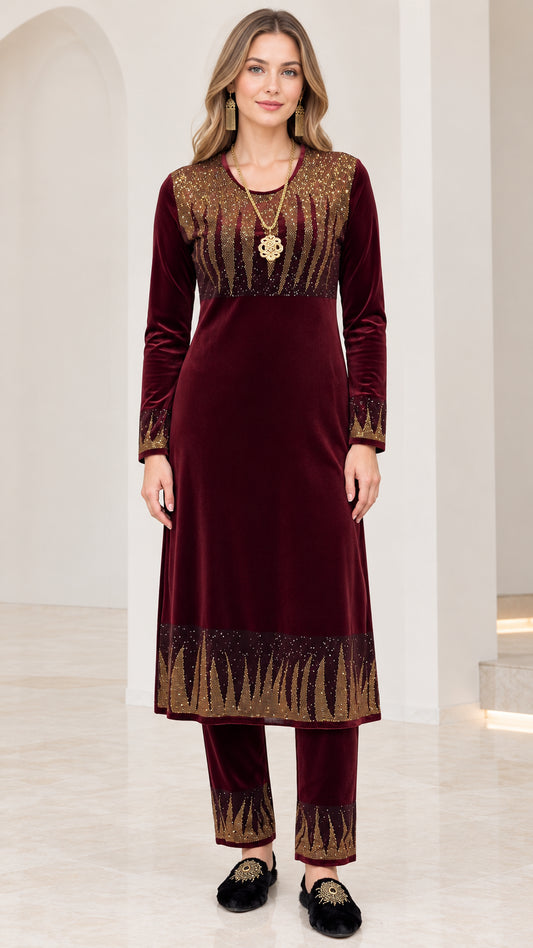 Full front view of women's burgundy velvet tunic and matching straight pants with gold embellishments