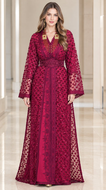 Full-length front view of woman wearing magenta embroidered beaded kaftan dress with belt