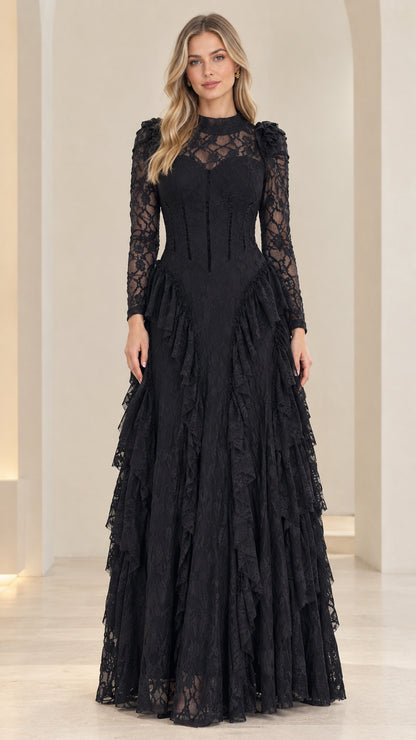 Front full-length view of woman wearing black illusion high-neck tiered lace evening gown