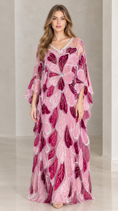 Front view of model wearing pink floral beaded kaftan maxi dress with crystal V-neckline