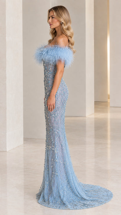 Side profile view of sky blue off-the-shoulder beaded formal dress with sweep train