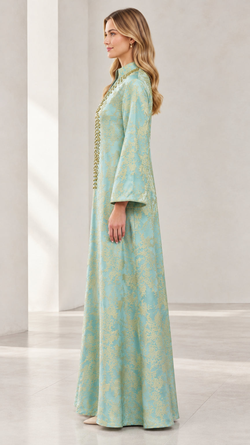 Side profile view of woman in Mint Green jacquard long sleeve kaftan dress