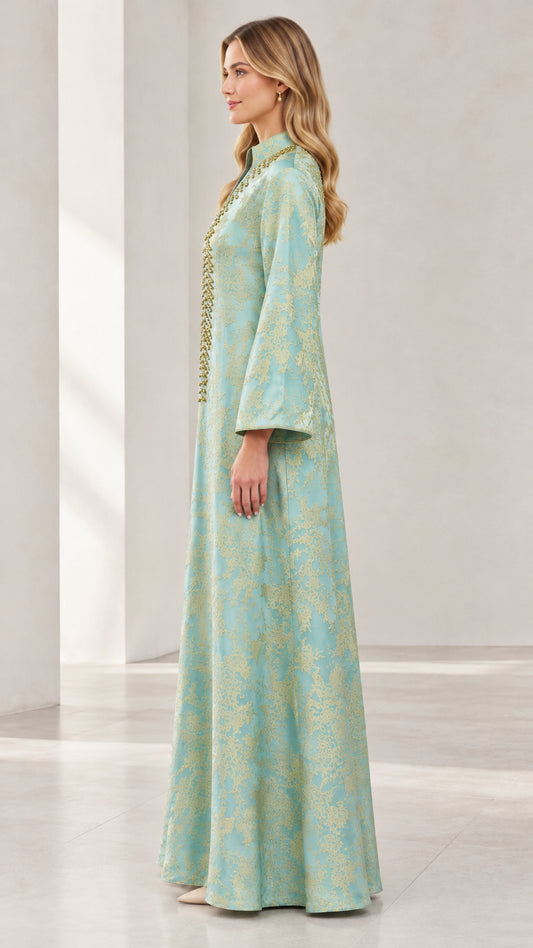 Side profile view of woman in Mint Green jacquard long sleeve kaftan dress