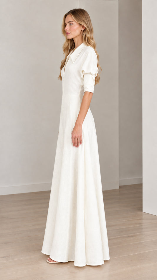 Side profile view of model wearing an Ivory White collared wide-leg maxi jumpsuit
