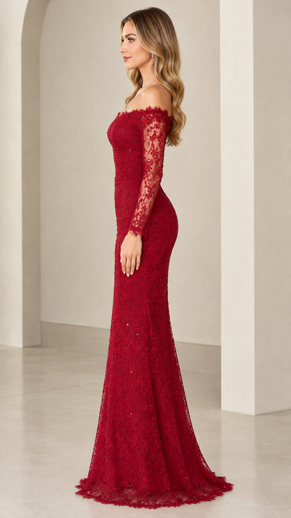 Side profile of woman in burgundy fitted lace mermaid maxi gown