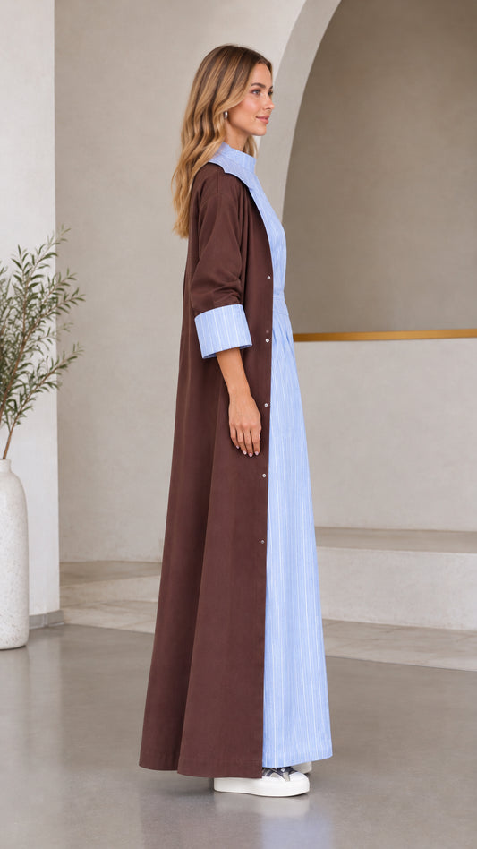 Side profile view of women's brown maxi coat and light blue striped set