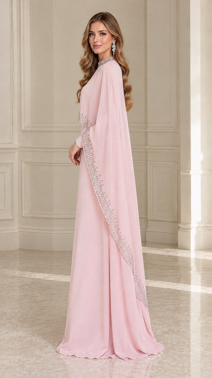 Side profile view of Blush Pink cape sleeve formal gown showing draped silhouette