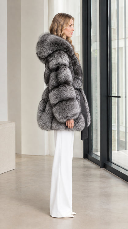 Side profile view of the silver grey belted faux fur hooded coat