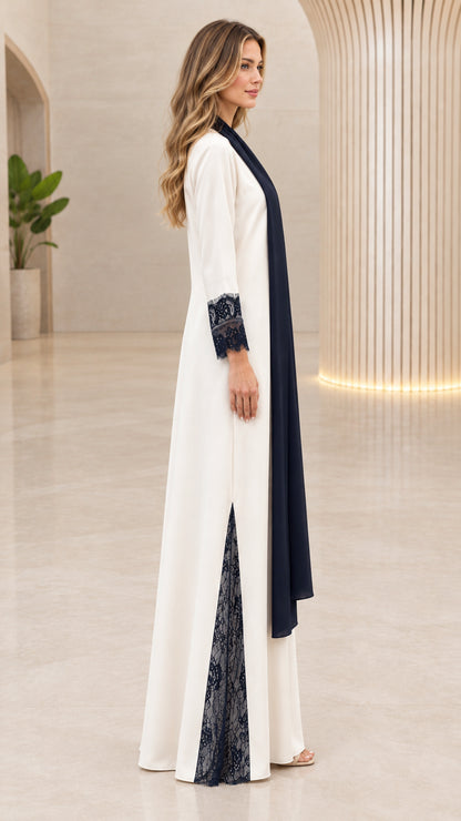 Side profile view of cream lace-trim maxi abaya showing side slit detail