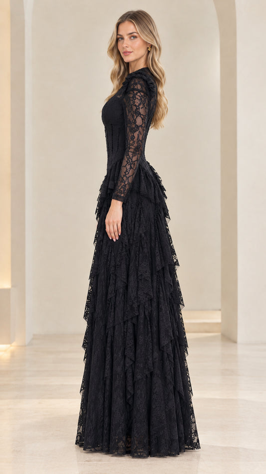 Side profile view of woman wearing long sleeve black tiered lace maxi dress