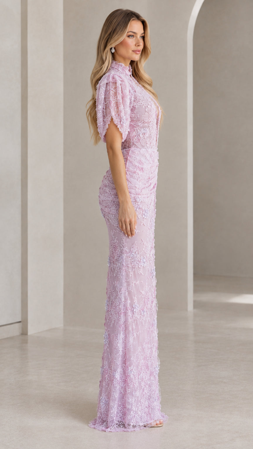 Side profile view of lavender embroidered lace formal evening gown