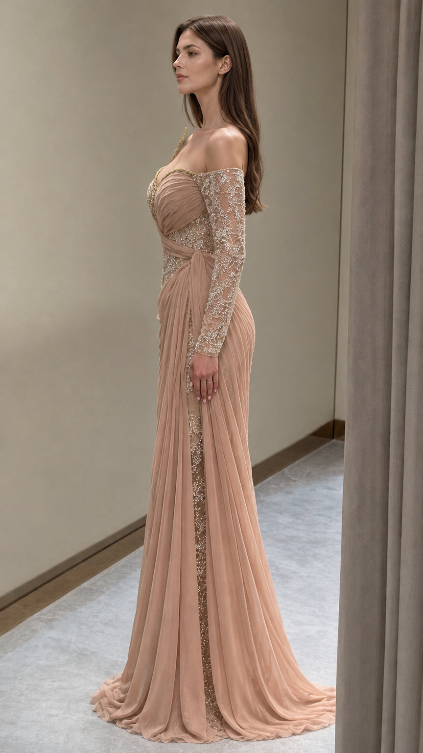 Side profile of champagne formal draped maxi dress with long embellished sleeves