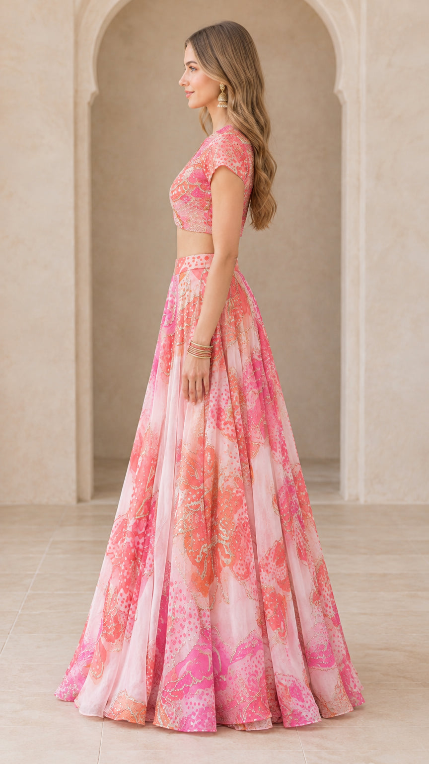 Side profile of blush pink printed two-piece crop top and maxi skirt set