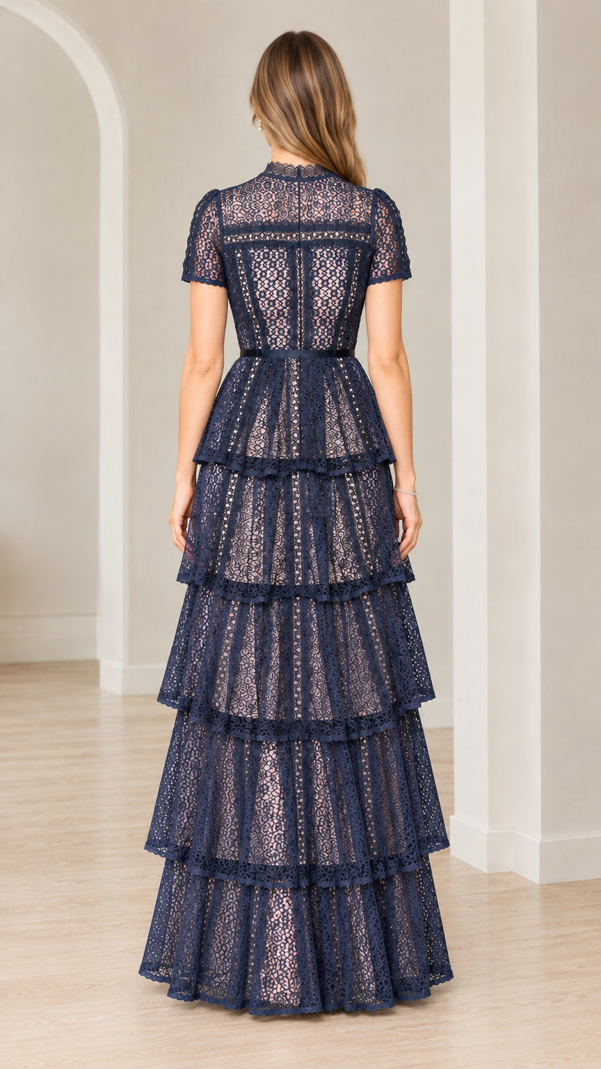 Back full-length view of Navy Blue tiered lace formal dress with high neckline