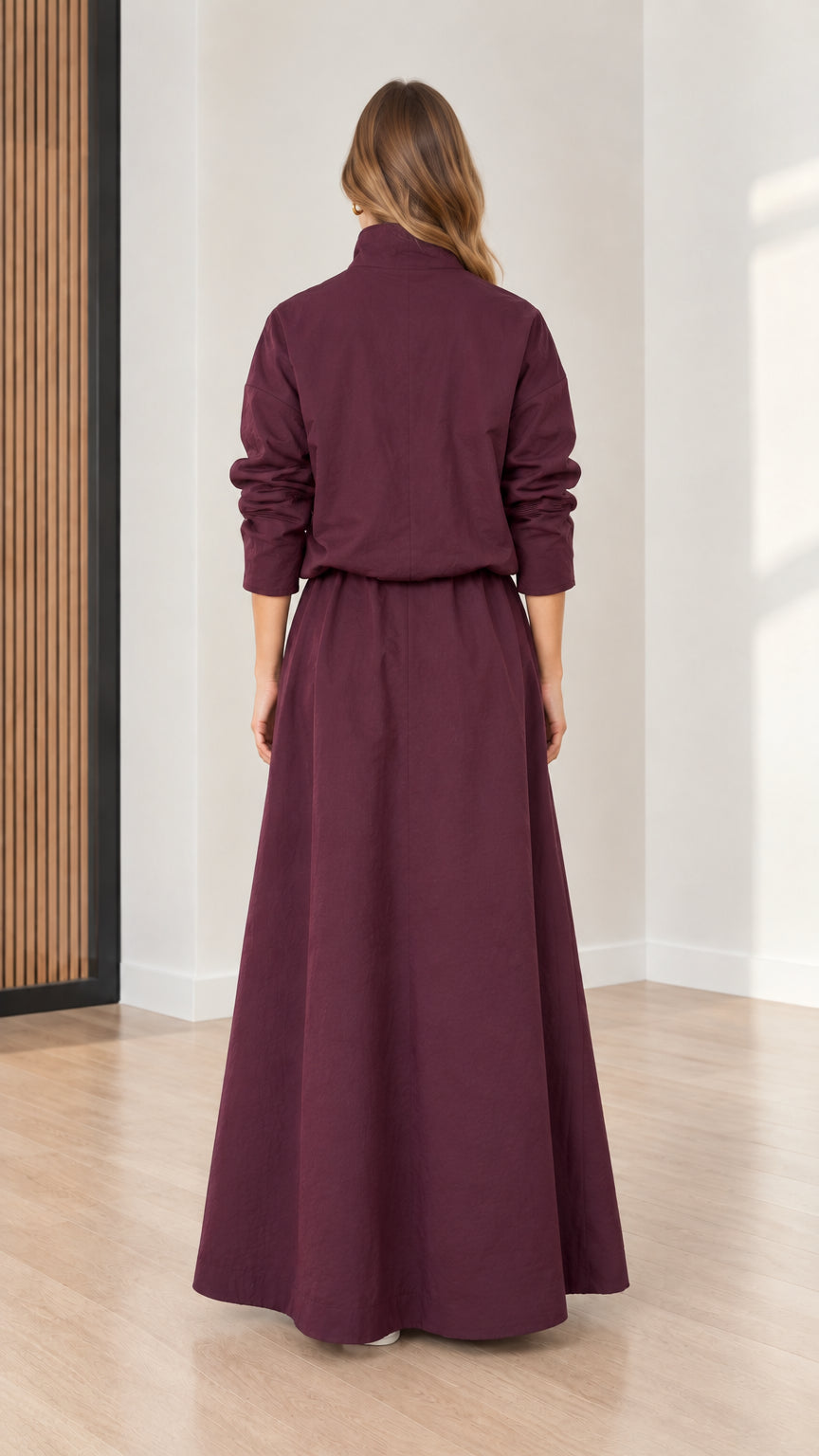 Back view of model wearing long sleeve Burgundy maxi dress