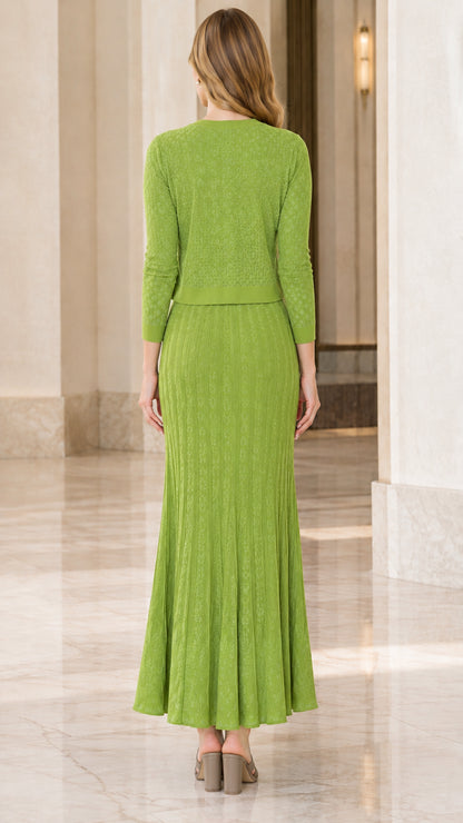 Model wearing lime green textured knit dress set back view