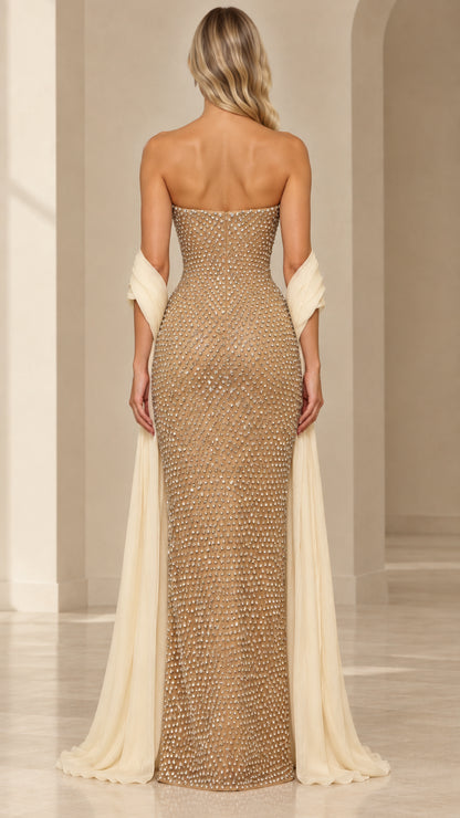 Back view of champagne embellished strapless floor-length evening dress
