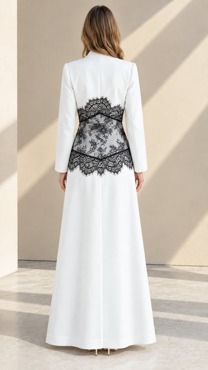 Back view of white formal pant set highlighting floral lace detail across the waist