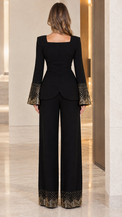 Back view of black square neck top and wide leg pants set