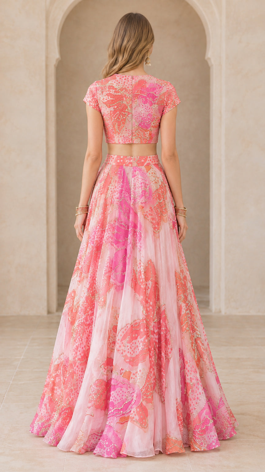 Back view of blush pink printed two-piece formal evening skirt set